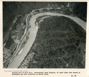 'Looking east at mile 39.1.  Quinnimont, West Virginia, at upper right with branch of Chesapeake and Ohio extending up Laurel Creek.'