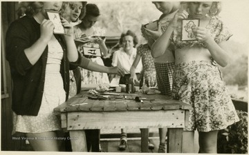 Justine McCue, in background, a 4-H leader and instructor of this silhouettes class.