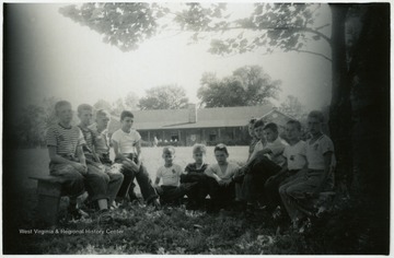 'Class in conservation at County 4-H camp, taught by E. B. Wriston of the Conservation Commission.'