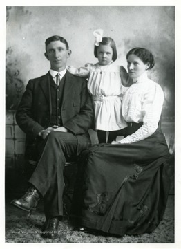 Ira D. Cox and Dora Alice Pritchard Cox with their daughter, Lucille Cox.