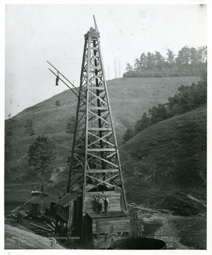 'Wooden oil rig on Cox's Mill lease, located on Claude Bowyer Farm, Gilmer County.'