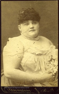 'Annie Bell, age 19 , weight, 507.'