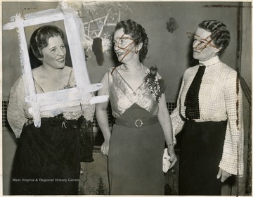 'Crusader Margaret Sanger Celebrated the 21st anniversary of her birth control movement at a dinner in Washington, D.C. Feb. 12.  Left to right: Leaders in the movement as they appeared at the dinner; Mrs. Pearl Buck, missionary author; Mrs. Sanger and Mrs. Thomas N. Hepburn, mother of Katherine Hepburn stage and screen star.'