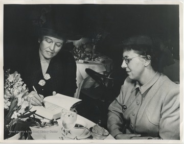 'Mrs. Hunter starts now to collect autographs, and Pearl Buck is the first to sign her own book.  Harry Scherman, president of the Book-of-the-Month Club also signed the presentation copy, as did the Club's five distinguished judges--Henry Seidel Canby, Christopher Morley, Dorothy Canfield, Clifton Fadiman and John Marquand.  That made quit a special volume for Mrs. Hunter to treasure and she said it was going on the top shelf of ther book case, away from the hands of her three active children.  Both Mr. and Mrs. Hunter consider reading their most important recreation and find enough time to keep up with the new books despite their main family and business duties.'
