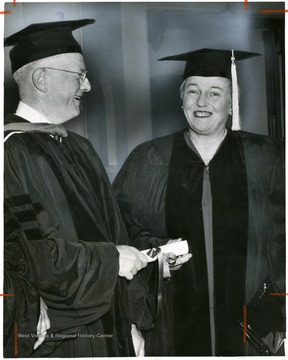 'Dr. Burgess L. Gordon, president of Woman's Medical college of Pennsylvania, presents honorary degree of Doctor of Humane Letters to Pearl Buck at commencement.'