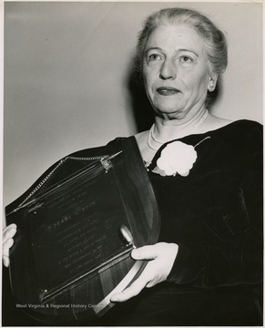 'Novelist Pearl S. Buck holds 13th annual B'Nai B'rith Inter-Faith award which she received for her work promoting understanding among people.'