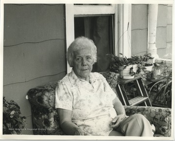 Alice Hammons Wilfong on front porch.