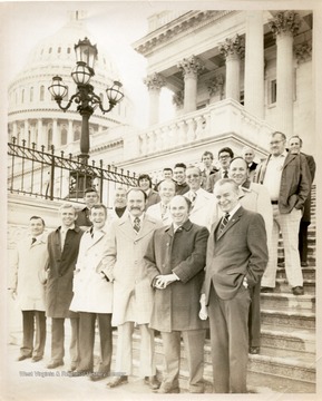 Group of men on steps near Capitol Building in Washington, D.C.; Senator Robert C. Byrd on the bottom row, first from right.