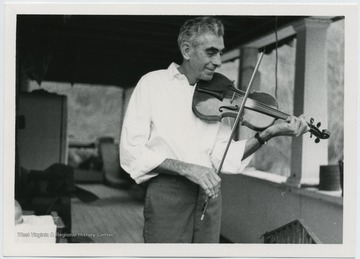 Melvin Wine playing the fiddle in Copen (Burnsville), Braxton Co., W.Va.