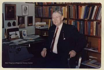 Roy Bird Cook in his office.