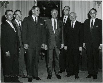 Gov. Smith in center, and second from left, Neil Bolyard