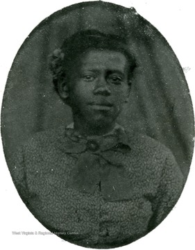A portrait of an unidentified African American girl from the Ellison-Dunlap collection, Monroe County.