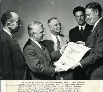 'Above are pictured Emil Telfel (vice-president), Reese D. James (chairman, Committee on Awards), P.I. Reed (president), and A.L. Higginbotham (secretary-treasurer) on the occasion of the presentation of a Citation to Editor &amp; Publisher (received by George Brandenburg, Chicago editor) by the American Society of Journalism School Administrators June 28, 1946, at the Statler Hotel, St. Louis.'