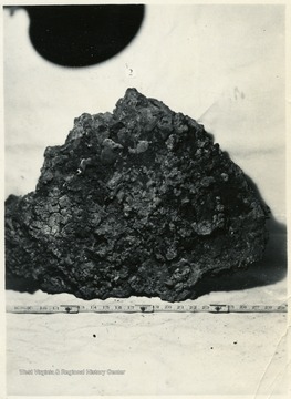 Photograph of coal being measured.