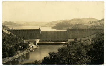 The Dam facts: Supervision: Corps. U. S. Army Engineers, Pittsburgh, Pa.; Contractors: Frederick Snare Corp., New York, N. Y.; Width: 1900 FT.; Height: 265 Ft.; shoreline of Lake: 68.6 Miles.