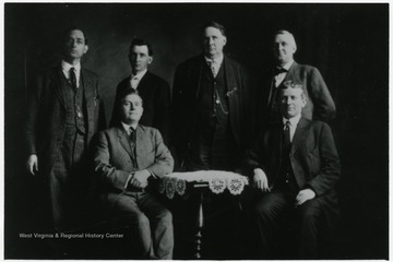 A group photograph including Dr. Elliott R. Hatfield, Joe Hatfield, and Cap Hatfield.