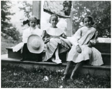 'Helen Quarrier Miller, Caroline Brooks Ward, Margaret Fleming Ward at Oak Hall their Grandfather's summer home in Oakland, Md.'