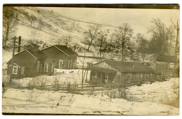 The company house is on the right and the station on the left; Jack Blaker possibly lived here and operated the station.