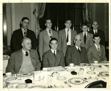 Back row on the further left: E. A. Carter, President W. Va. State Federation of Labor, second from the right on the back row is John Dean--winner of the Essay contest.  Also included State Superintendent of Schools Dr. W. W. Trent, County Superintendent of Schools, Virgil L. Flinn; Principal of Stonewall Jackson High School Professor Horner.   Ronald Bowley, David McClure, Dane Bogges and Theodore Smith are runner ups. 