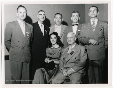 Standing left to right : Guy Hoffman (6th District), William J. Staddon (2nd District), James Q. Papas (4th District), Allen Hudkins (4th District), Rene Zabeau (3rd District). Seated: Ruth Ann White (5th District), C.V. Baumann (1st District).