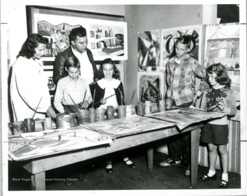 Grace Martin Taylor at studio with children and others.