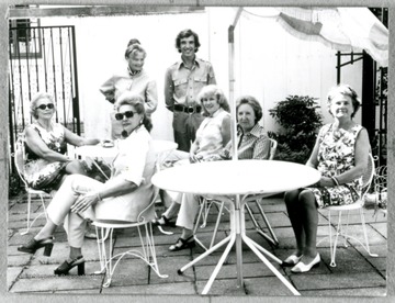 Grace Martin Taylor on a patio with others.