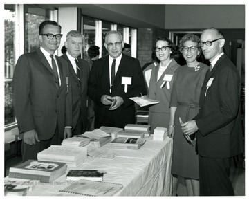 The third from left is Dr. Clark Sleeth.