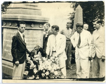 The photo was taken at Mt. Wood Cemetery in Wheeling honoring S. P. Hullihen, M.D., D.D.S. (father of Oral Surgery in U. S. ): some attendees in the picture are identified as follows 1) C. Baxter Morris, D.D.S. President W. Va. State Dental Society 2) G. B. Writes, D.D.S., Pres. American Dental Assoc. 3)Edward P.  Armbrecht, D.D.S. Chairman Hullihen Day Celebration, City of Wheeling 4)F. N. Carroll, D.D.S., Pres. Wheeling district Dental Society 5)W. D. Giesler, D.D.S., Member of  Wheeling District Dental Society. 