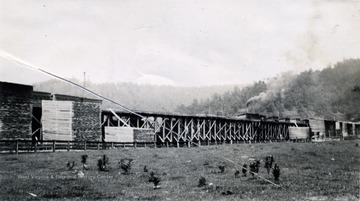 'The piles of softwood lumber in the yard of the Cherry River Boom and Lumber Co., at Richwood are the products of the rapidly disappearing virgin stands in that territory.'