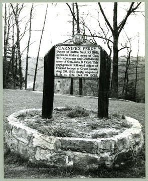 The historic marker of Carnifex Ferry reads: Scene of battle, Sept. 10 1861 between Federal army of Gen. W. S. Rosecrans and Confederate army of Gen. John B. Floyd.  This engagement followed defeat of Federal troops at Cross Lanes, Aug. 28, 1861.  State acquired title to site, Oct. 29, 1935.