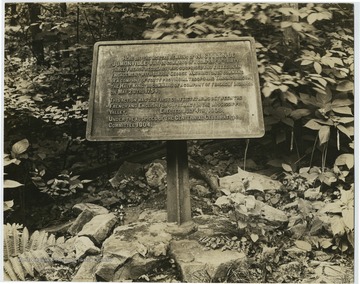 Marker showing site of the grave of N. Coulon de Jumonville on Route 40 near Uniontown. ' Here lie the mortal remains of N.Coulon De Jumonville who, in command of a company of thirty-three French Regulators, was surprised and killed in an engagement with Major George Washington in command of a company of forty Provincial Troops and Tannacharison, the Half King,in command of a company of friendly Indians on May 28th, 1754. This action was the first conflict at arms between the French and English for supremacy in the Mississippi Valley. Erected July 4th, 1908, under the auspices of the Centennial Celebration Committee 1904.'