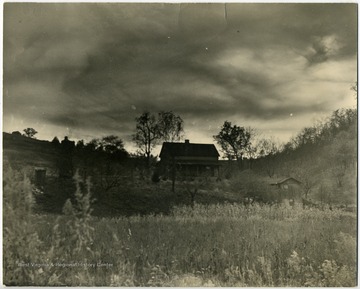 The Out House is to the right of the house.