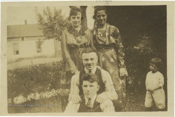 Standing in the back, Eva Pietro(L) and Rose Salucci Pietro(R). Kneeling in the front, Lawrence Pietro(L) and Rocco Salucci(R).The little boy in the background is Lawrence Pietro Jr.