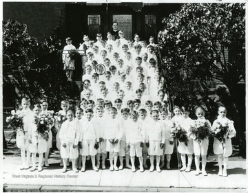 'Picture taken on the convent's steps. The boy circled in the picture is Gilbert J. Meyer, Sr.'