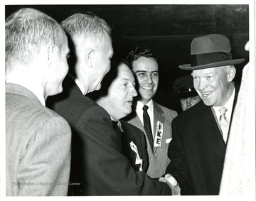 From left to right: Senator John D. Hoblitzell, Jr., Senator Chapman Revercomb, Unknown, Governor Cecil Underwood, President Dwight Eisenhower.