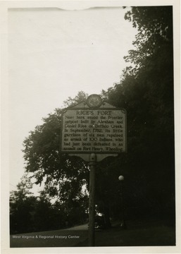 Sign reads 'Near here stood the frontier outpost built by Abraham and Daniel Rice on Buffalo Creek. In September, 1782, its little garrison of six men repulsed an attack of 100 Indians, who had just been defeated in an assault on Fort Henry, Wheeling.'  Rices Fort located on Donegal Twp. Washington County, PA.