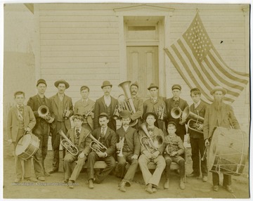 'Walter Mestrezat is seated in the center of the photo.