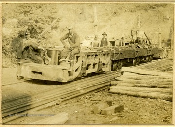 A view of miners on carts.