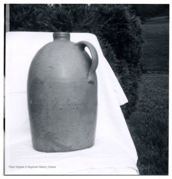 A #2 jug believed to be used in the Thompson Inn at now known as the Old Stone House on Chestnut Street.  The jug was identified with a label of the inn.