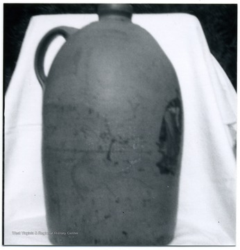 A #2 jug believed to be used in the Thompson Inn at now known as the Old Stone House on Chestnut Street.  The jug was identified with a label of the inn.