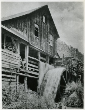 This photograph was published in "Tumult on the Mountain" by Roy Clarkson. The caption includes, "... built in 1850 on Spring Run, 6 mi. S. Petersburg, Grant County.  Courtesy Bishoffs Studio &amp; Camera Center"