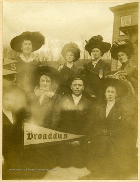'Taken at Hardway Home, Lost Creek, W. Va. Front row- far right, Gertrude Hardway(a student). Back row(1st and 3rd) from left, Calora Hardway and Margaret Hardway, sisters. Probably others are Broaddus Students. 