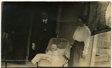 ' Otto and Calora with their daughter Cornelia at six months. She sat alone at 5 and half months old. '