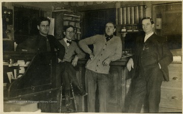 Dr. Otto Ladwig (right) at the Raine-Andrews Lumber Company. 