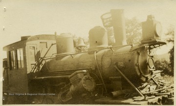 'M. M &amp; D. D. Brown logging equipment brought into Elkins, W. Va., yard near sawmill for storage and reshipment to Spring Creek, W. Va.'.