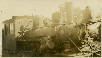 'M. M. &amp; D. D. Brown logging equipment brought into Elkins yard near sawmill for storage and reshipment to Spring Creek, W. Va.'.