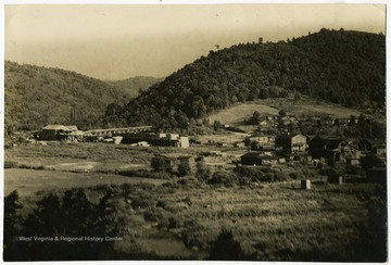 'Picture of Glady Manufacturing Company, Glady, W. Va. Company started about 1912, Richard Chaffey, President. Photo, probably about 1916 shows Spring Hill land owned by Richard Chaffey in 1938. Springs and reservoir supplying town of Glady with water 1905 to Sept. 12, 1938.'