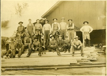 Mill workers, back row, left to right: 1.Unidentified, 2.Unidentified, 3.Warnick, 4.Poling, 5.London Poling, 6.Irvin J. Poling, 7.Unidentified, 8.Clarence Yeager. Front row, l to r: 1.Unidentified, 2.Cletus Channell, 3.Sheffey Simmons, 4.Unidentified, 5.George McDaniel, 6.Unidentified, 7.Unidentified, 8.Howard J. Wilmoth, 9.Pleasant Poling, 10.Unidentified.  