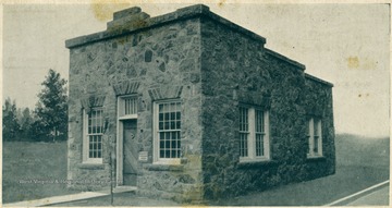 'This unique structure was built in the summer of 1924, after the diastrous fire, April 17,1924. It contains lumber and stone from each of the six districts of Pendleton County, with stone brought from every historic and scenic point in the county, including its highest points, which are the highest in West Virginia, comprising a complete geologic column, from the earliest to the lastest formation, and set undressed in crazy design. Inside it has all modern improvements of heat, light, and plumbing, including steam heat in addition to open fire-place.' 