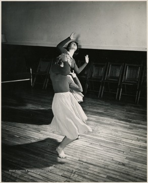 Portrait of two female dancers. In the front is Delores Jamison. Behind is Barbara Shumaker.